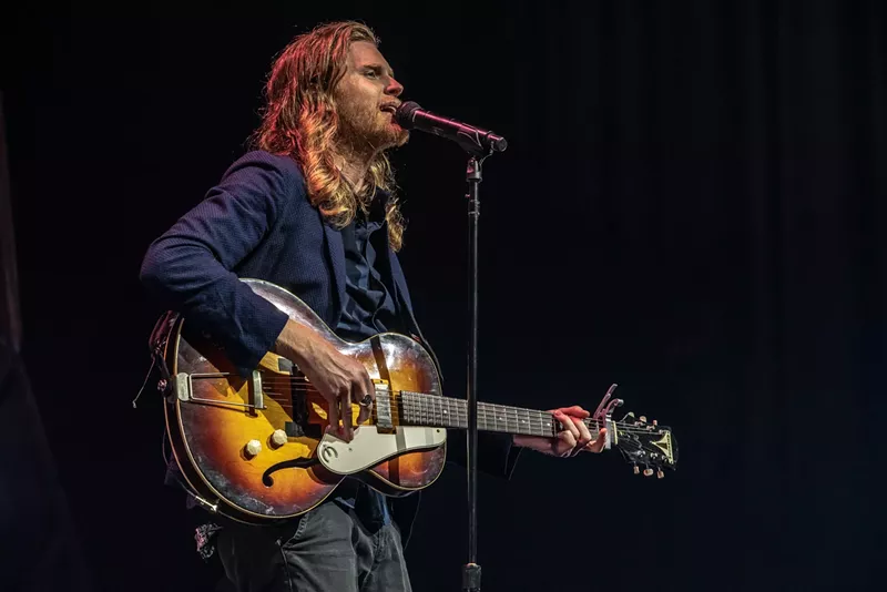 Image: Wesley Schultz of the Lumineers sings to the crowd at the grand opening of the Mission Ballroom on August 7.