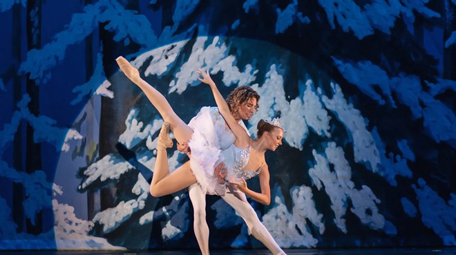 two ballet dancers on stage
