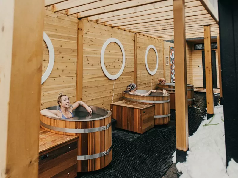 Image: People soaking in cold plunge pools at Portal Thermaculture