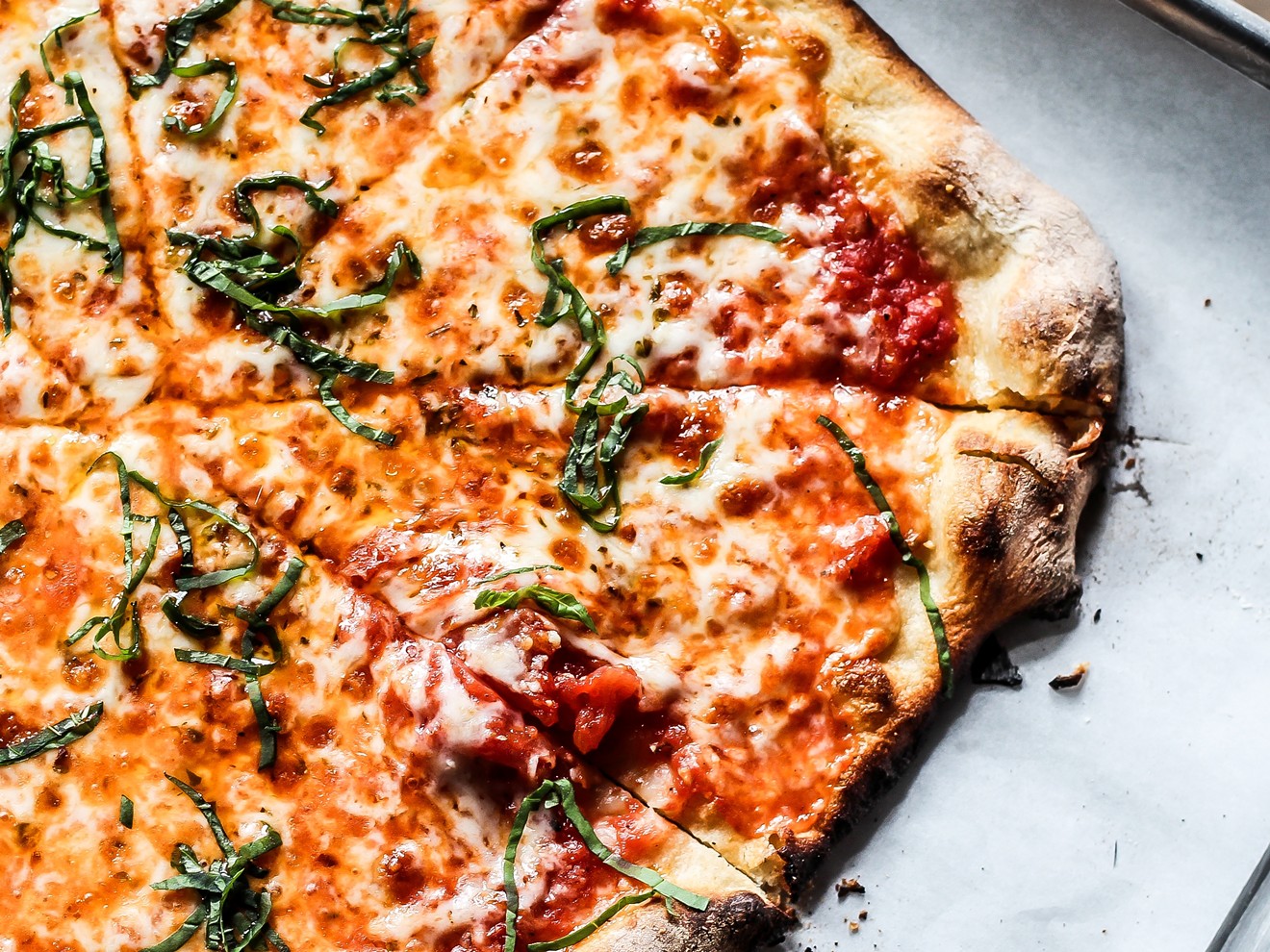 Get a New Haven-style pizza for lunch for just $10 through the end of June.