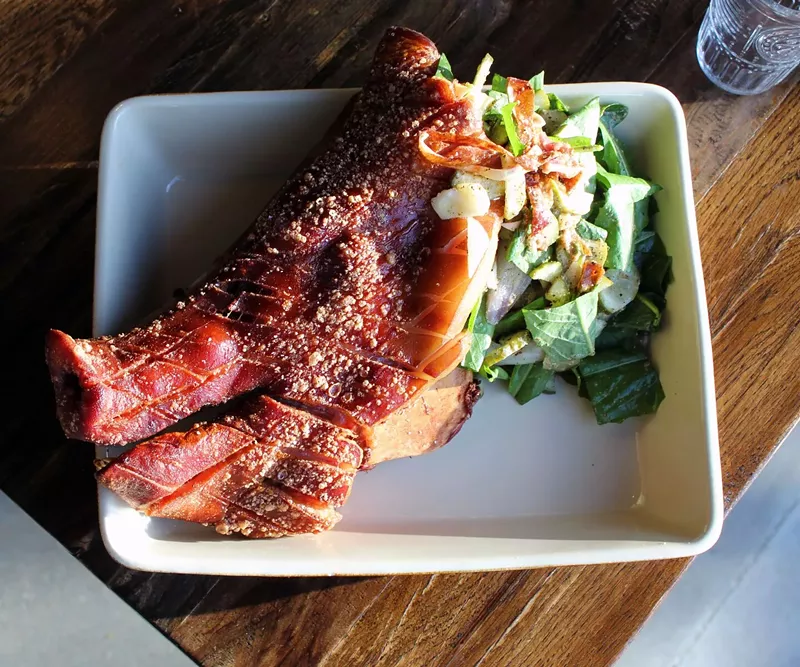 Image: Here, piggy, piggy. Carve roast pig and pumpkins at Julep this weekend.