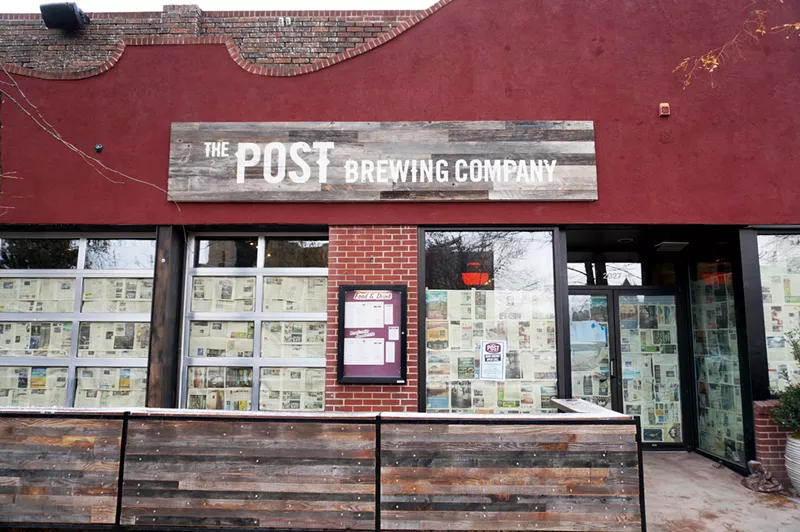 Image: The paper will be coming off the windows on Thursday, November 2, at the new Post Brewing Company.