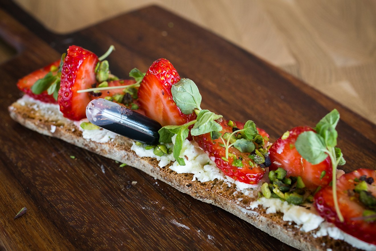 Strawberry, goat cheese, twelve-year balsamic, mint pistachios, and lemon honey bruschetta at Cattivella, which is participating in Denver Restaurant Week.