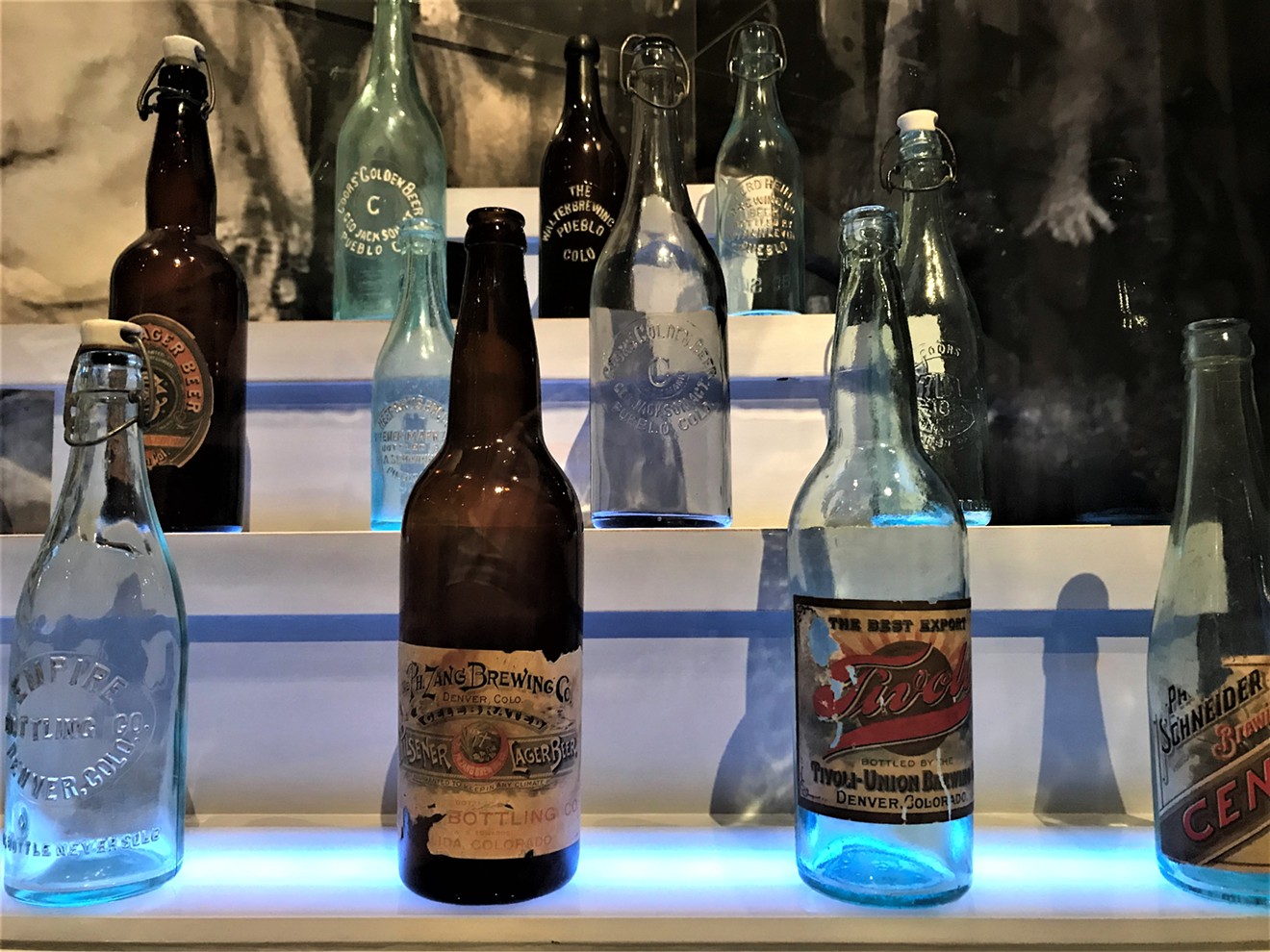 A selection of old bottles on display at History Colorado's Beer Here!