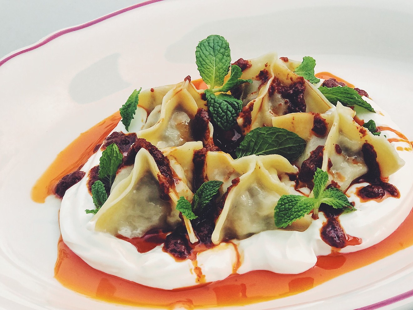 Manti (Turkish lamb dumplings with chili oil and garlic yogurt) are on Safta's menu for the month of November.