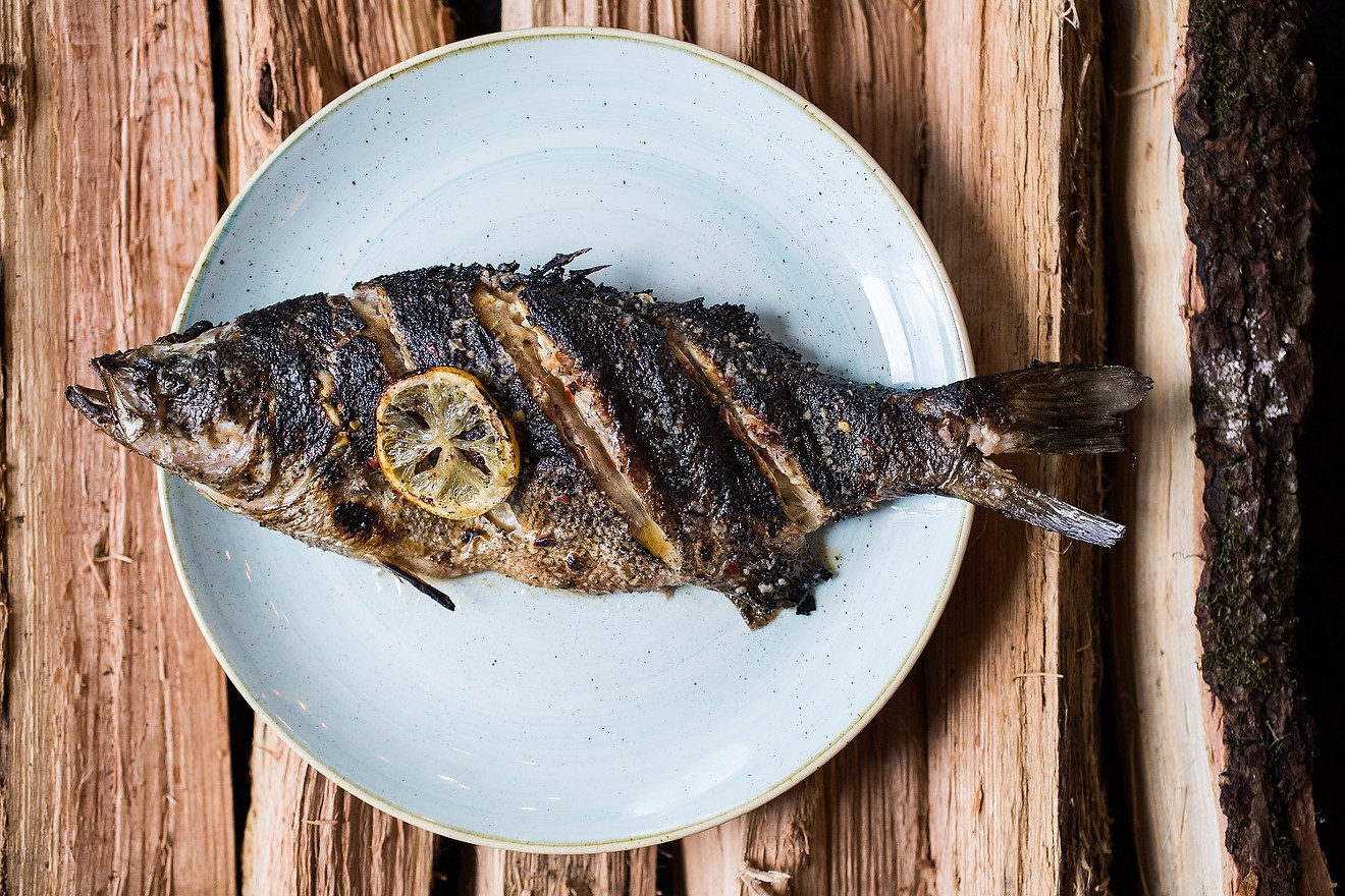 Whole fish can be a tough sell, but Fish N Beer flies through its wood-grilled seafood.