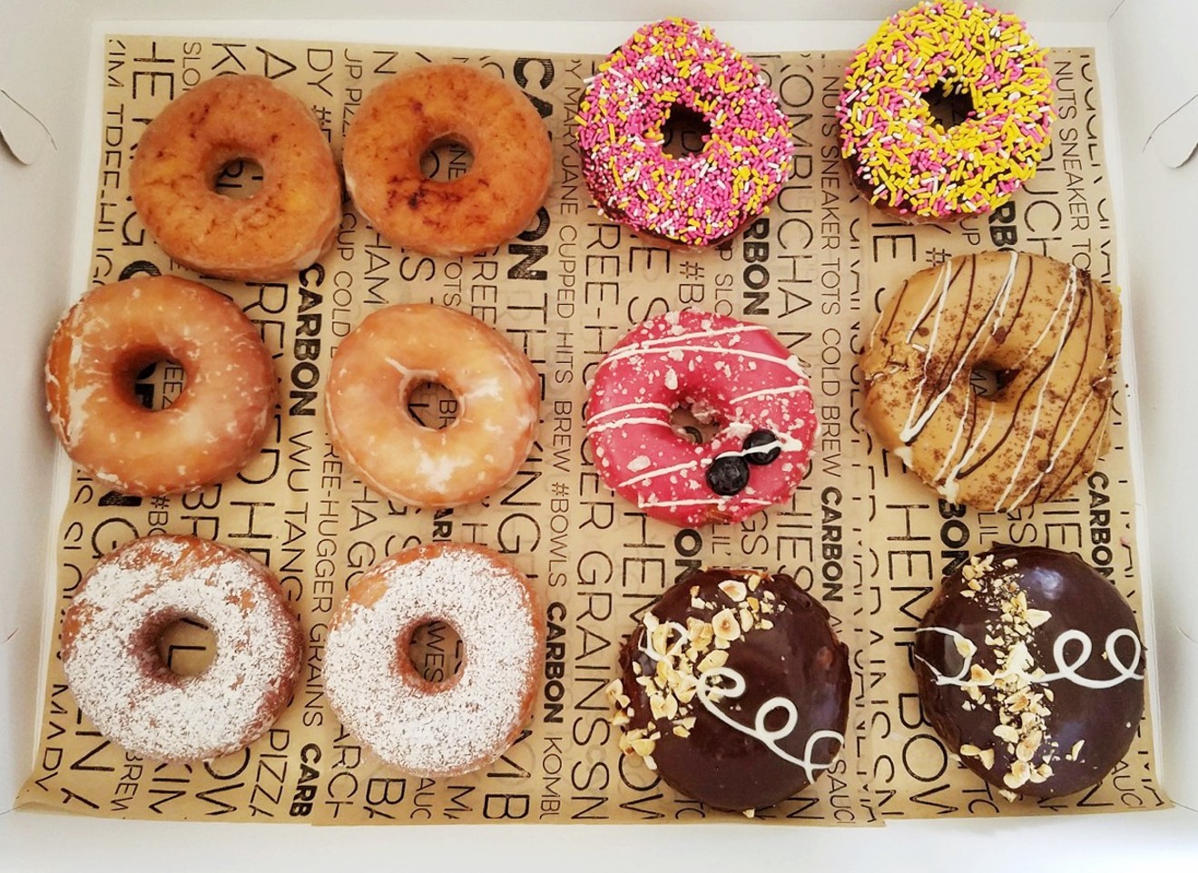 A dozen doughnuts from Habit Doughnut Dispensary.