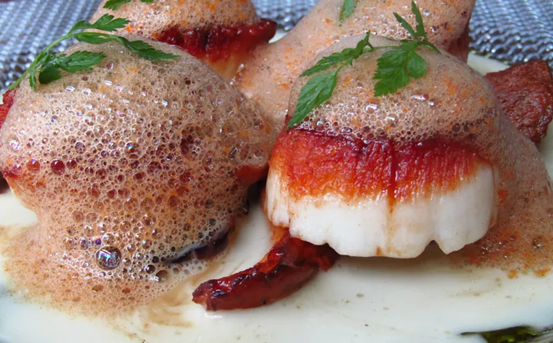 Image: Seared scallops with lobster foam at LeRoux.