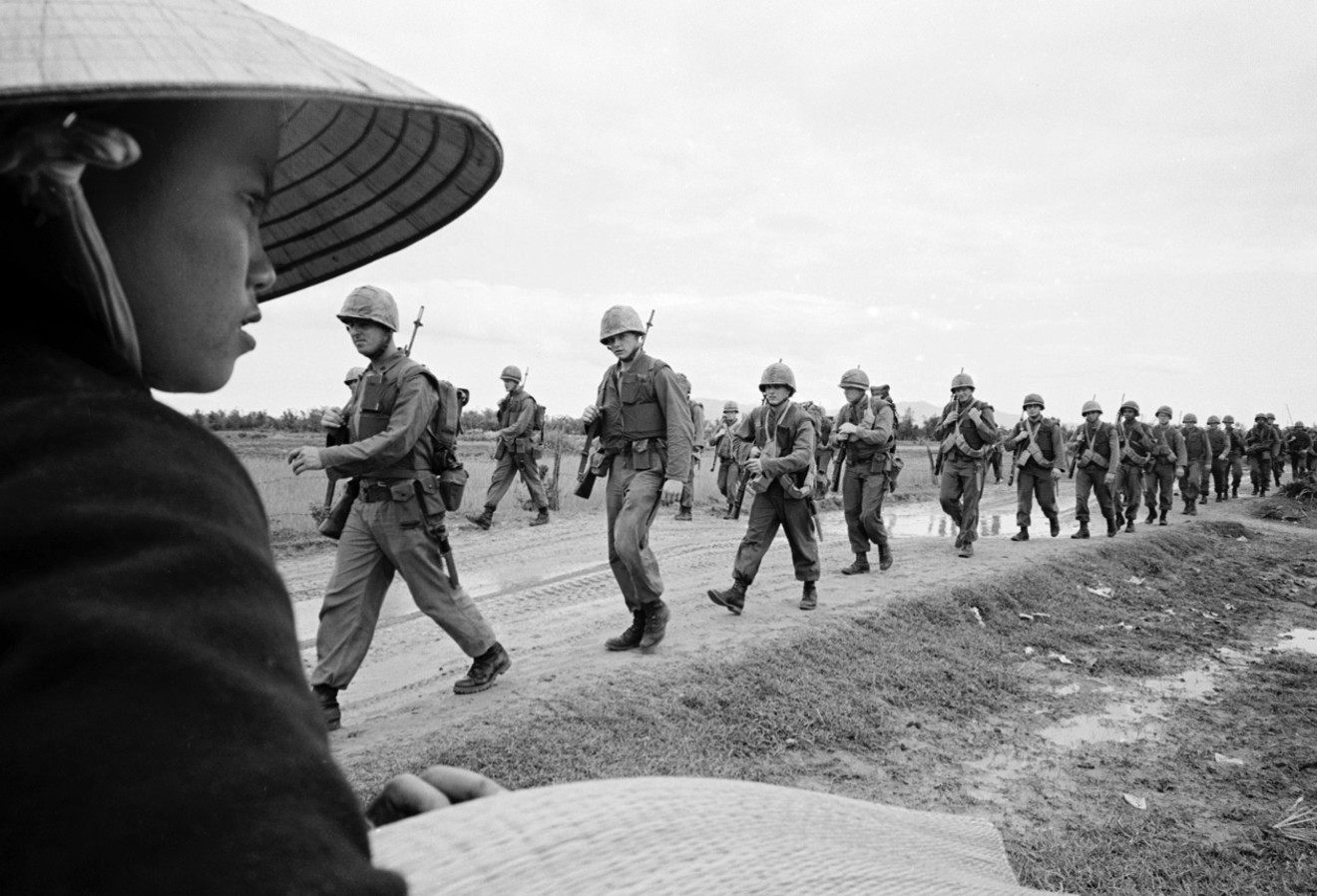 U.S. Marines, marching in Da Nang in March 1965, were among the subjects of The Vietnam War, an eighteen-hour, ten-part documentary by Ken Burns and Lynn Novick.