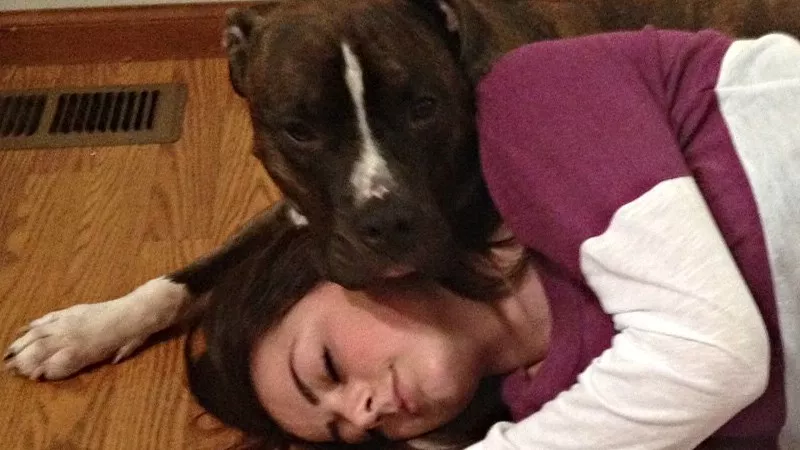 Image: Olga Jeleznova cuddling with Bandit before the biting incident.