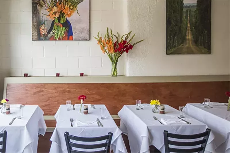 Image: Get cozy with your neighbors at Bistro Barbès.