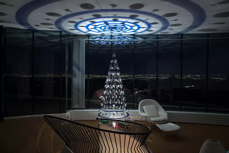 Image: A Modern Christmas Tree overlooks Denver from inside the Sleeper House.