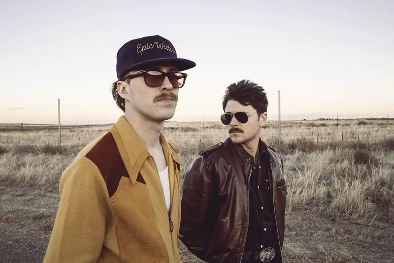 Image: Kellen Wall and Bryce Menchaca of Marfa standing in a field