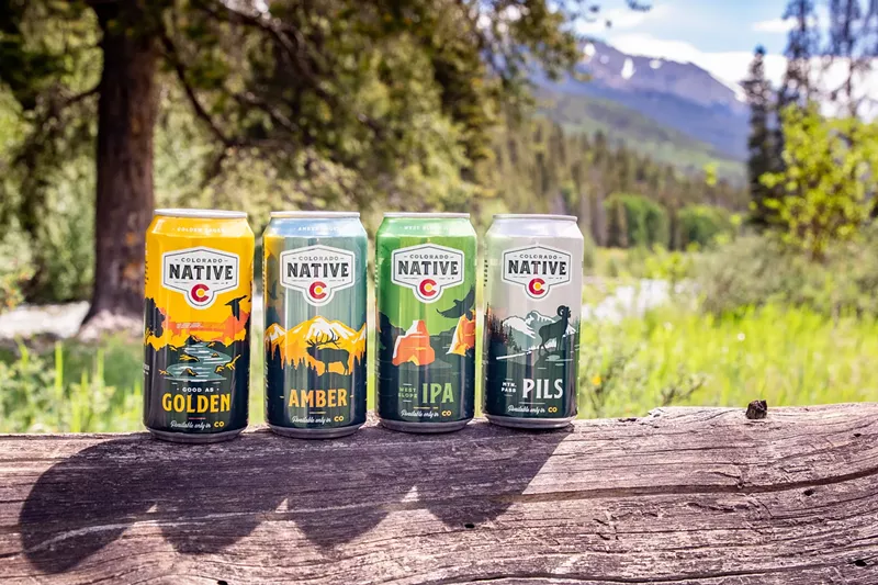 Image: four cans of beer line dup outdoors