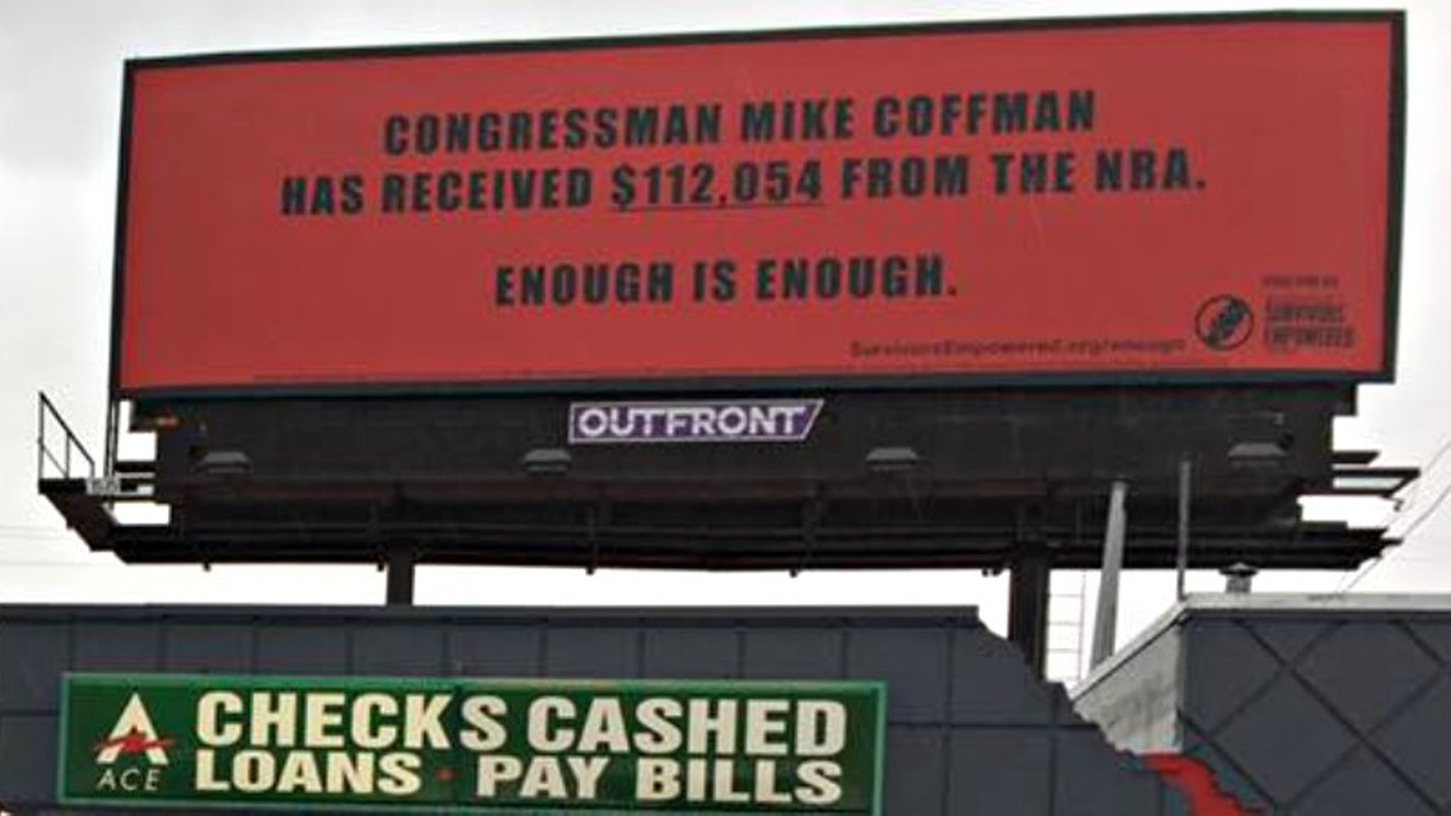 The billboard targeting Representative Mike Coffman is located near Exposition Avenue and South Monaco Parkway.