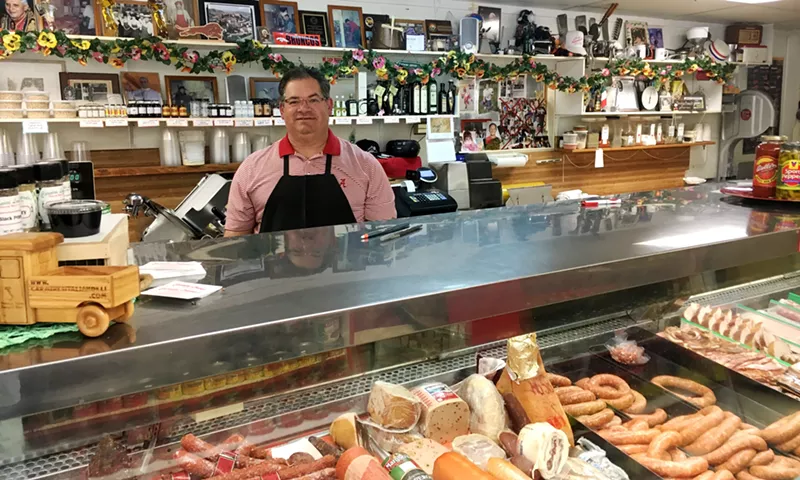 Image: Carmine Lonardo presides over the deli and butcher shop founded by his father, also Carmine Lonardo.