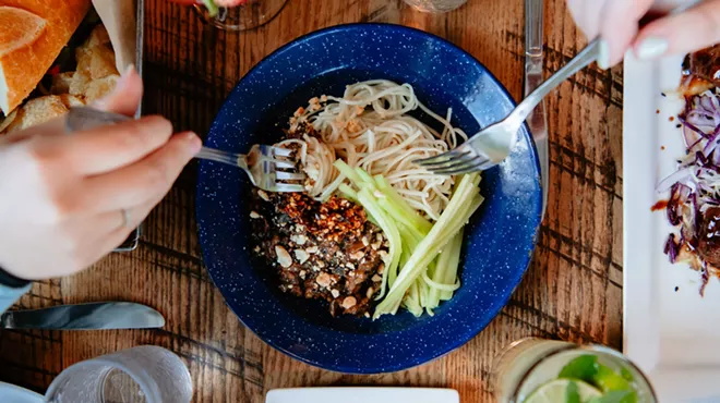 a bowl of noodles with vegetables