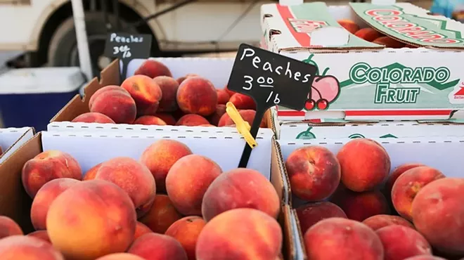 peaches in boxes