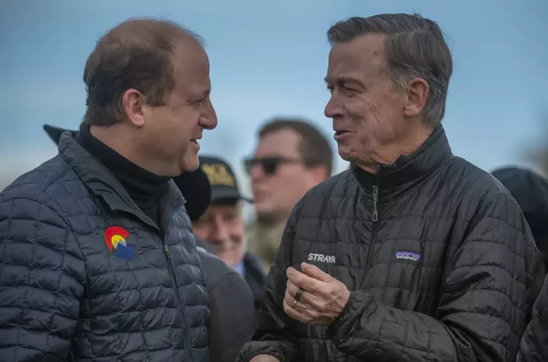 Image: Colorado Governor Jared Polis talks with U.S. Senator John Hickenlooper