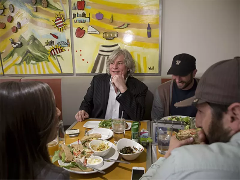 Image: Tom's Urban founder Tom Ryan enjoying a meal at the Larimer Square restaurant when it opened in 2012.