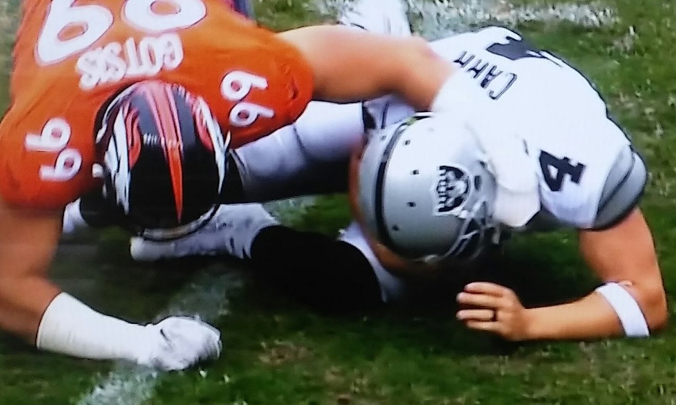 Raiders quarterback Derek Carr was injured after being sacked by Broncos defensive lineman Adam Gotsis.