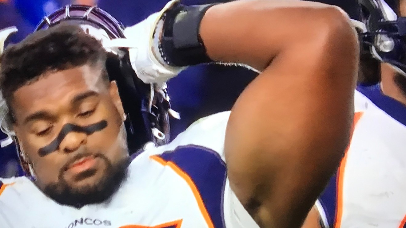 The Broncos' Dre'Mont Jones seconds before slamming his helmet in frustration over the team's inability to stop the Cleveland Browns.