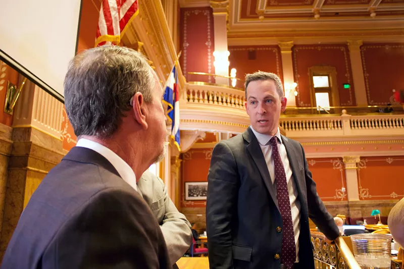 Image: Senate President Steve Fenberg and Minority Leader Paul Lundeen argue on the Senate floor.