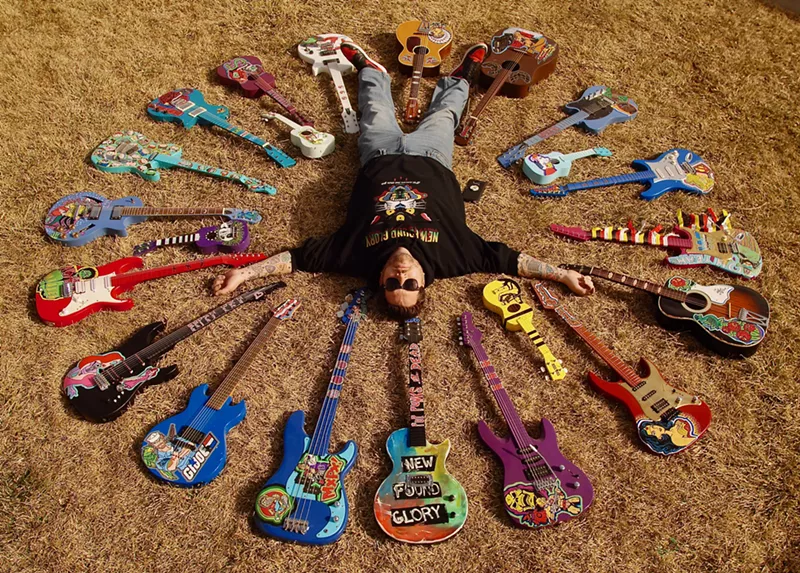 Image: Musician and artist Patrick Wolfmeier has combined his love of painting and guitars into a successful and unusual business.