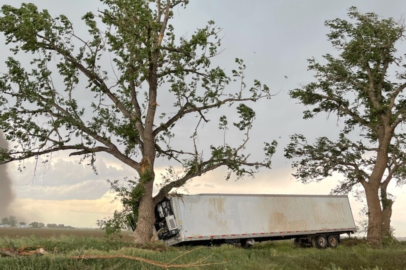 A semi trailer was thrown across a field at Miller Farms when a tornado touched down on June 7.