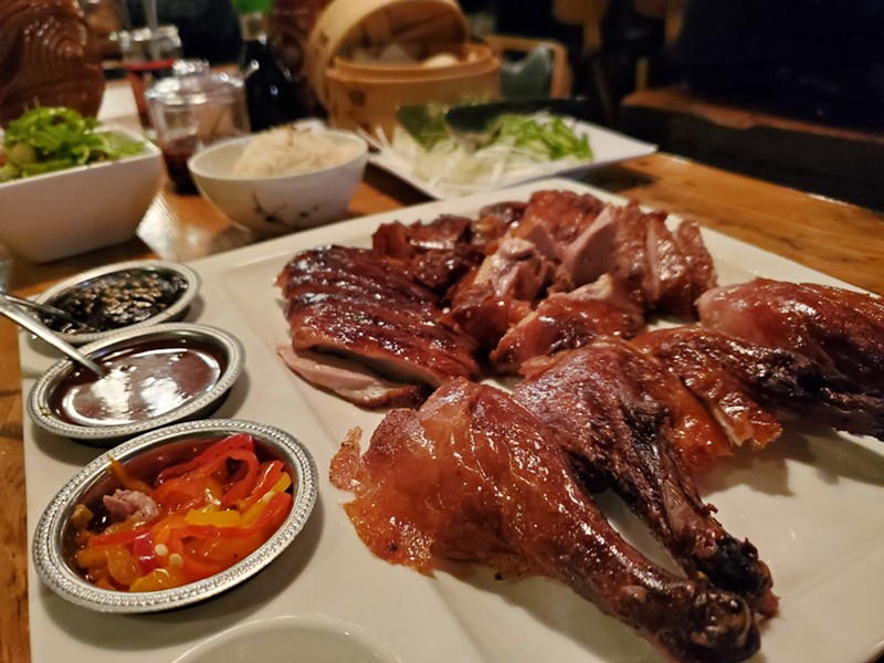 The Peking duck is carved tableside.