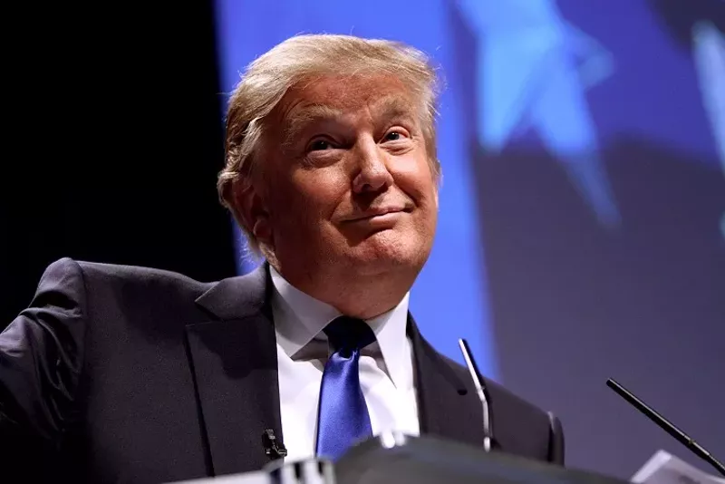 Image: Donald Trump against blue background