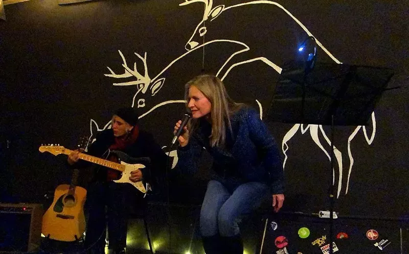 Image: Roseanna Frechette reading at Deer Pile for LINK Denver.