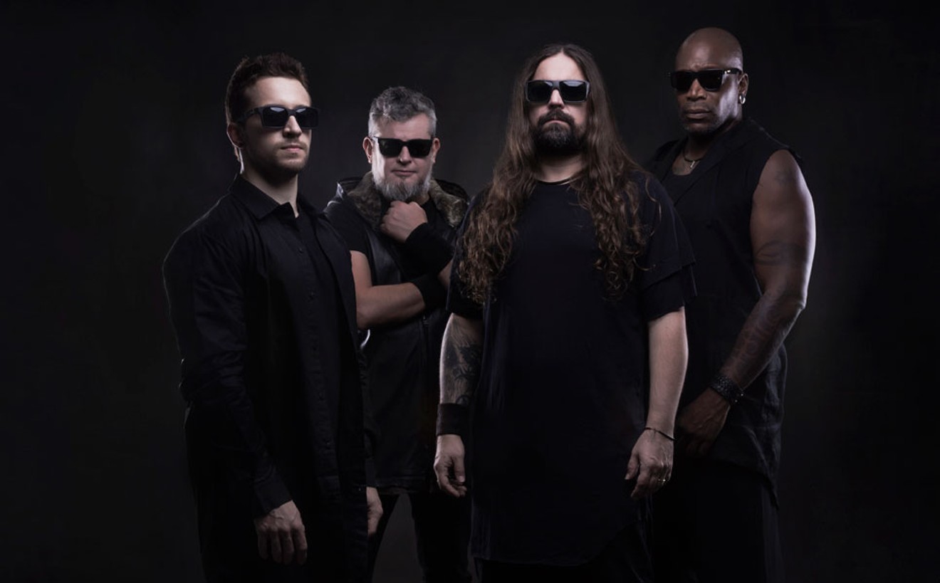 Derrick Green (far right) has fronted Sepultura for twenty years, but many still think of him as “the new guy.”