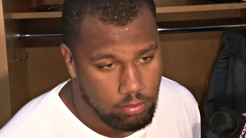 Image: Bradley Chubb looking bummed while meeting the press after the Broncos' gut-wrenching loss to the Chicago Bears on Sunday.