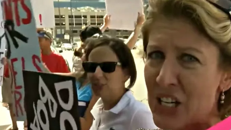 Image: Protesters after the announcement that Andy Mendelsberg is out as principal of East High School.