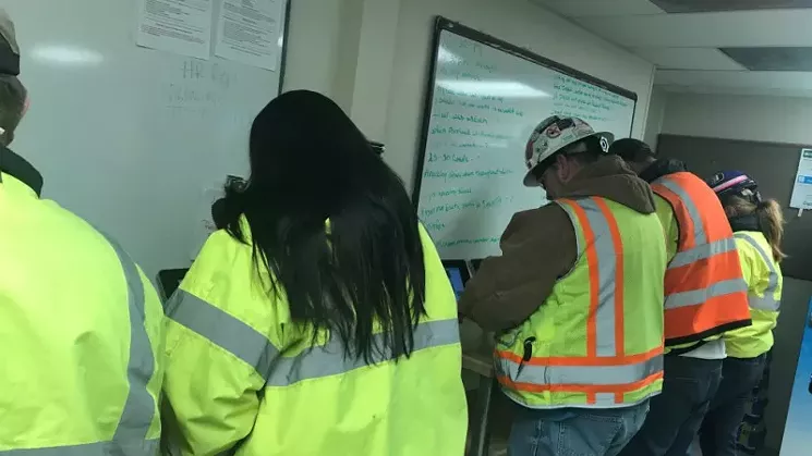 A construction crew performs the Alert Meter test before heading to the job site. - COURTESY OF ALERTMETER.COM