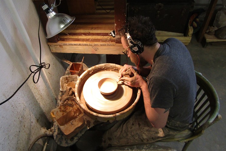 Mencini demonstrates how a bowl is made. - MARK ANTONATION