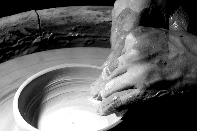 Mencini crafts a bowl out of clay. - MARK ANTONATION