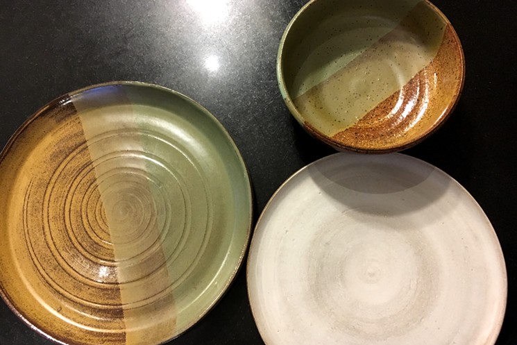 A sampling of Rocco  Pottery's dinnerware. - MARK ANTONATION
