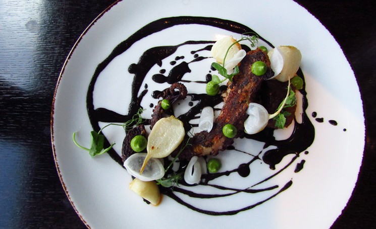 Barbecue octopus with merguez sausage, black barbecue sauce and Tokyo turnips. - MARK ANTONATION