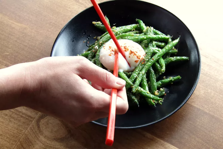 Sir-fried green beans with preserved mustard root, dried shrimp and a slow-cooked egg. - MARK ANTONATION