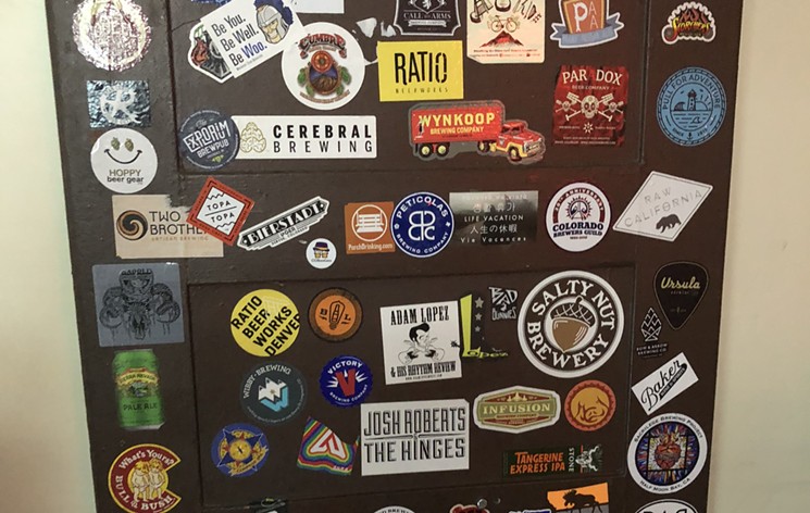 Beer lovers, and beer stickers, abound at Star Bar. - SARAH MCGILL