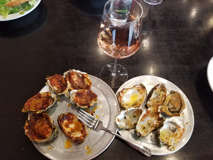 Wine goes well with grilled oysters at Angelo's. - KRISTA KAFER