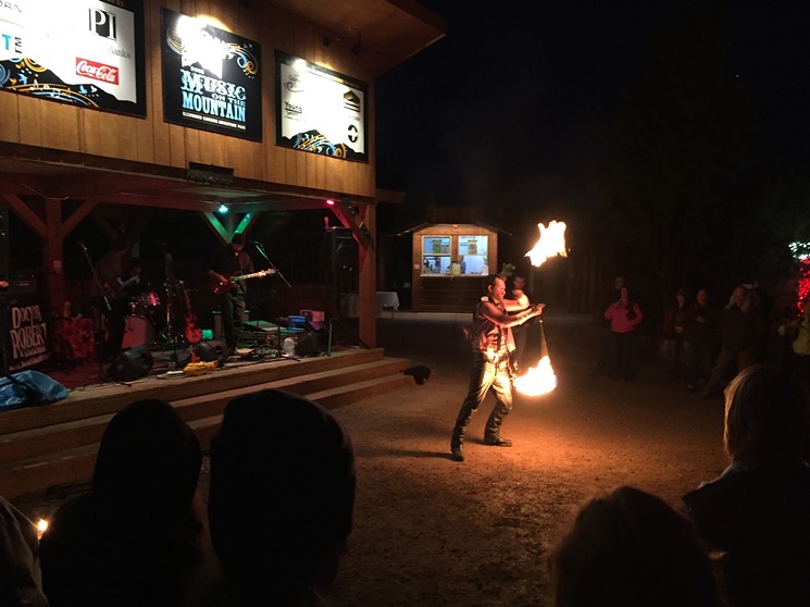 Dance of the Sacred Fire will be spinning flames at Music on the Mountain's free show this weekend. - COURTESY MUSIC ON THE MOUNTAIN