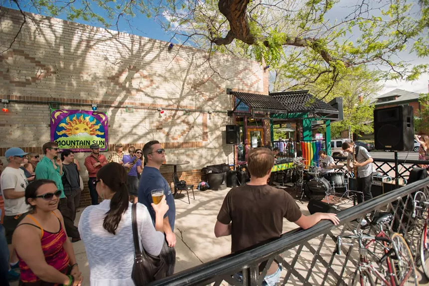 Bring your dolla dolla bills to Vine Street Pub for its patio party; the joint is cash-only. - RICH VOSSLER