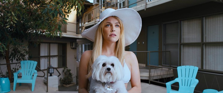 Riley Keough plays Sarah, whose disappearance leads to an investigation in the comic L.A. mystery Under the Silver Lake. - COURTESY OF A24
