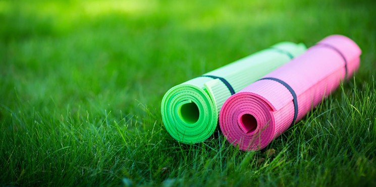 Roll out your mat in the grass. - CREATIVE COMMONS