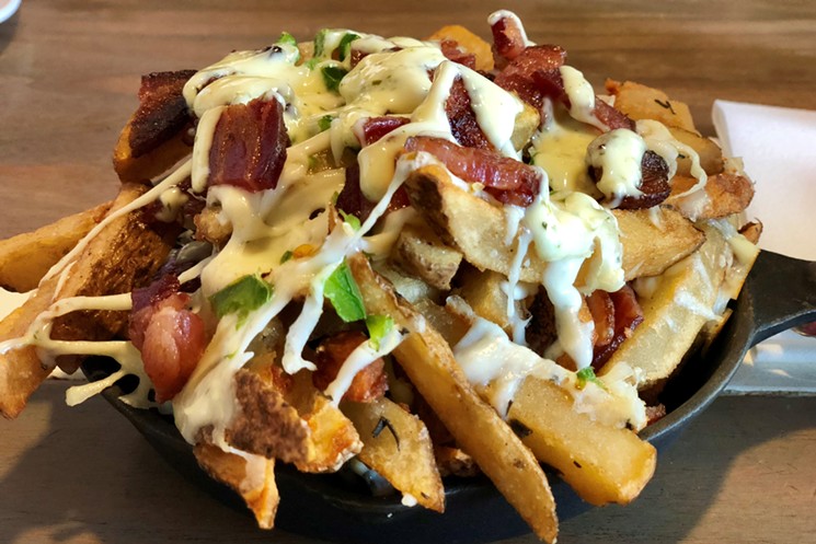 Fries loaded with bacon and other goodies. - MAUREEN WITTEN