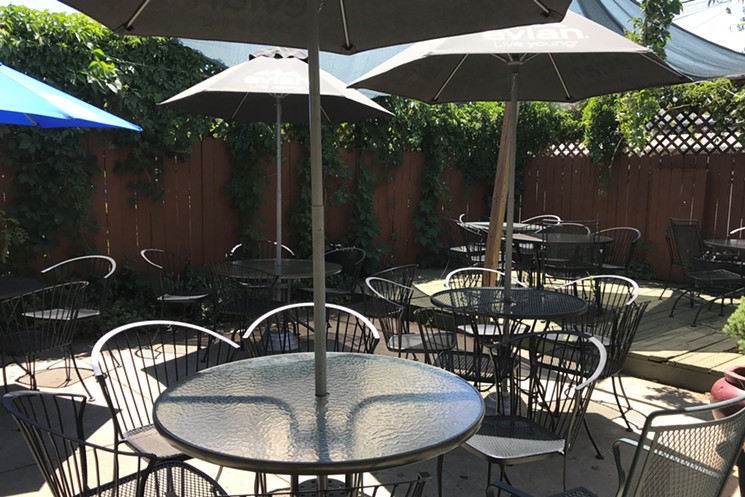The fenced-in patio at Hanson's is a cozy place to enjoy brunch. - BRIDGET WOOD
