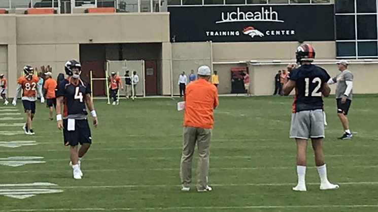 Quarterbacks Case Keenum and Paxton Lynch take the field. - PHOTO BY LORA ROBERTS